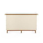 Back view of Toulon dresser showcasing plain canvas back and tan leather trim