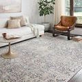 Lucia Charcoal Multi Rug styled in a modern living room with white sofa and brown leather chair