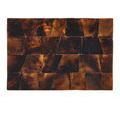 Top flat surface with glossy penshell pieces arranged to form an intricate patchwork pattern