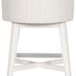 Rear view highlighting curved backrest upholstery and cross-braced white wooden legs