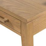 Detailed joint and wood grain on corner of Armstrong Desk tabletop and leg