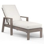 Laguna Chaise Lounge with hand-brushed aluminum frame mimicking driftwood and plush white cushions