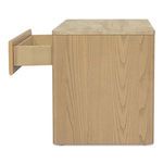 Profile view of the table with drawer fully extended showcasing side wood grain texture