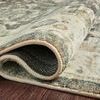 Rolled corner reveals thick pile and fabric backing of Rosette Slate / Ivory Rug