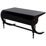 Back right angled view revealing the curved closed panel supporting the tabletop and turned legs