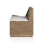 Highly detailed macro shot of the light beige cushion fabric texture and stitching