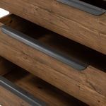 Close-up showing interiors of open drawers with smooth pine wood and finger joints
