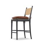 Angled rear view highlighting tied leather cushion and linen backrest on Fayth Bar + Counter Stool
