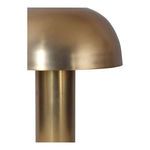 Close-up of Nanu Table Lamp’s brass rounded shade and cylindrical base highlighting the metal texture