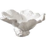 Side view of white textured bowl showing outer matte finish and detailed irregular edges with sculptural base