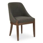 Edward dining chair angled view highlighting rounded backrest and generously padded seat