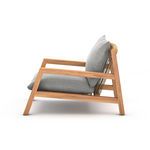 Soren Outdoor Chair side profile with close-up on angled teak armrest and grey cushion with white weave