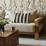Alternate view of Ditmar pillow on couch highlighting cozy living room setting