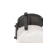 Top view showing circular English bronze iron fixture mounting to ceiling
