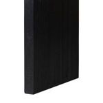 Detailed view of the solid block leg showing vertical wood grain and finish