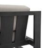 Back angle view highlighting panel design of chair frame and cushion support
