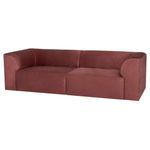 Isla Sofa in muted rusty red fabric with modern, minimalist design, gently arched back, and boxy base.