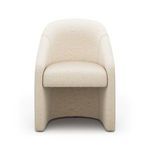 Levi Boucle Dining Chair in cream, sculpted curves with smooth upholstery and armless design