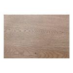 Detailed view of natural oak wood grain texture on coffee table surface