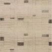 Flat lay of taupe rug showing full rectangular pattern with scattered dark blocks