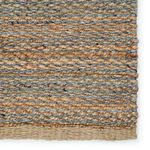 Macro view of thick weave showing tight, chunky braided texture and color mix