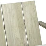 Close-up of vertical teak slats on the back panel with visible wood texture