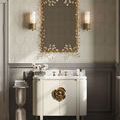 Pair of Bryce Bath Wall Sconces flanking decorative mirror in elegant taupe bathroom setting