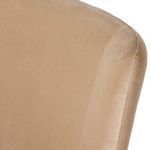 Close-up of upholstery seam with visible stitching accenting the curved backrest