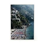 Vibrant photograph of Positano beach with colorful umbrellas and hillside houses on glossy recycled aluminum print float-m...