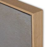 Close-up detail of natural wood frame corner and canvas texture of ocean wave painting