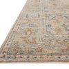 Close-up side angle showing Milena rug’s flat weave texture and detailed border design
