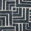 Long narrow Hagen rug with bold geometric maze pattern in dark blue and white tones