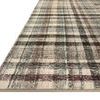 Angled view focusing on the rug's plaid pattern and clean, defined edges on hardwood floor