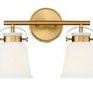 Kaden 2 Light Bath fixture with warm brass finish and frosted white glass shades in contemporary style