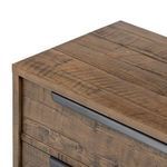 Close-up of gunmetal drawer pulls on darker-stained dresser highlighting flat handle design
