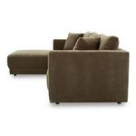 Side profile of Bryn sectional showing firm armrest structure and velvet upholstery texture