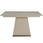 Front view of square dining table highlighting base shape and wood grain texture on white-cerused finish