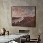 Painting displayed on textured wall above dining table with chairs and decorative vases