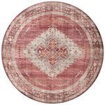 Round Heidi Sunset rug with central medallion and classic border in faded red and taupe tones