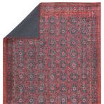 Back side and top view revealing solid dark blue underside of the rug