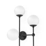 Close-up view of Armstrong 4 R Sconce showing three white matte globes on black rods and round wall base