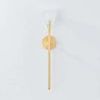 Maspeth Wall Sconce with elongated aged brass stem and gemlike faceted K9 crystal shade shaped like a blooming flower