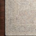 Corner close-up of Faye Ivory Multi Rug showing detailed weave and subtle color variations on dark wood floor