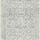 Charcoal machine woven rug with intricate vintage floral pattern in subdued gray tones