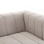 Close-up of vertical channels on corner of low Italian-inspired sectional sofa