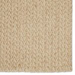 Close-up top view showing detailed chunky chevron weave pattern in natural beige fibers