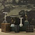 Irma Drinks Table in similar artistic styled room setting with dark landscape mural and various decorated side tables