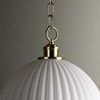 Close-up showing top of fluted glass shade with aged brass chain and ring attachment