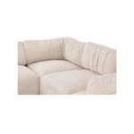 Close-up of corner seating area showing plush cushions with subtle wrinkles and soft chenille fabric