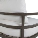 Close-up of sofa seat and back cushions with weather-resistant sling straps visible